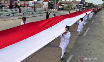 KNPI Kaltara Gelar Kirab Bendera Merah Putih Sepanjang 2.026 Meter di Tanjung Selor