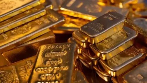 Jeblok Lebih dari 2%, Kilau Harga Emas Dunia Dicuri Dolar AS